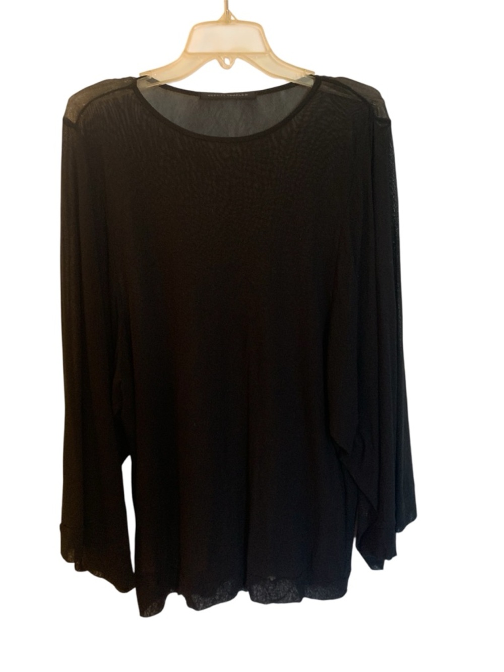 Sophisticated sheer and stretchy classic top